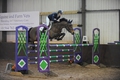 Chloe Reynolds Jumps to Victory in the SEIB Winter Novice Qualifier at Solihull Riding Club