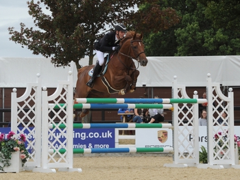 The Equitop Myoplast Senior Foxhunter Masters goes to Timothy Davies