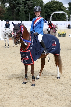 Emily Irvine wins Stepping Stones 128cm Championships Final