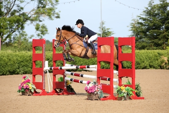 Claudia Moore wins The Stable Company HOYS 138cms Qualifier at The College Equestrian Centre, Keysoe