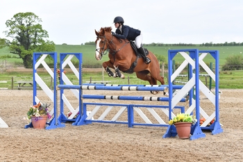 Erin McGee claims first place in the NAF Five Star Bronze League Qualifier at Muirmill Equestrian Centre