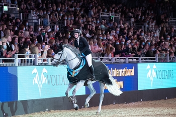 Jodie Hall-McAteer claims the Voltaire Design Under 25 British Championship at The London International Horse Show